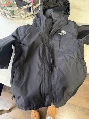 The North Face Black Hooded Rain Jacket girls medium size 10-12